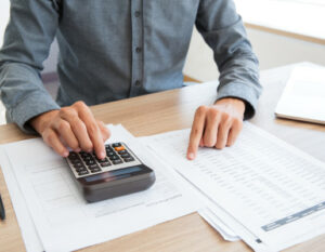 Unrecognizable man working with financial data preventivista