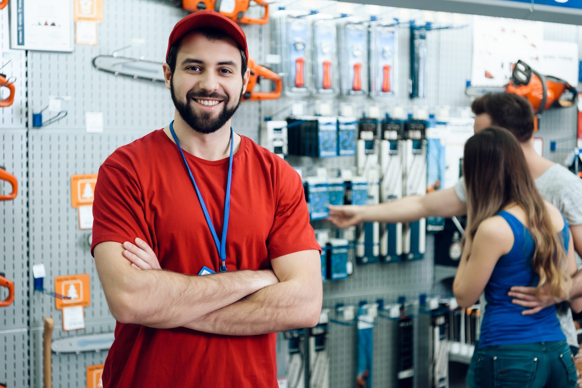 Salesman is Posing in Power Tools Store ricerca banconiere